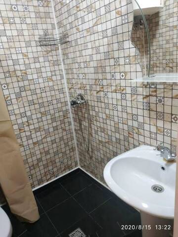 Фото номера Трехместный номер с балконом Апартаменты Guesthouse Dmitrieva г. Ялта 16