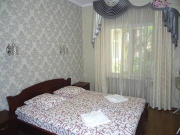 Фото номера Апартаменты с 3 спальнями Апартаменты Guesthouse Dmitrieva г. Ялта 3