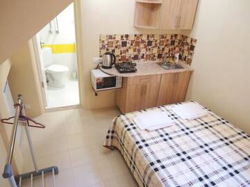 Фото номера Апартаменты - 1-й этаж Апартаменты Guesthouse Dmitrieva г. Ялта 3