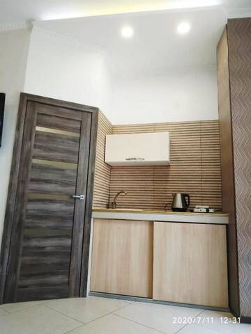 Фото номера Стандартный трехместный номер-студио Апартаменты Guesthouse Dmitrieva г. Ялта 6