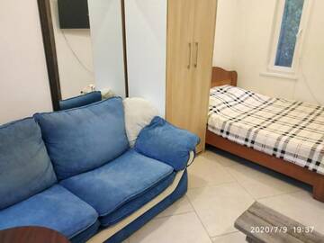 Фото номера Стандартный трехместный номер-студио Апартаменты Guesthouse Dmitrieva г. Ялта 2