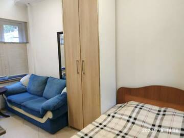 Фото номера Стандартный трехместный номер-студио Апартаменты Guesthouse Dmitrieva г. Ялта 4
