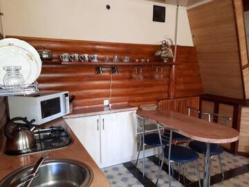 Фото номера Дом с 2 спальнями Гостевой дом Коттедж в Ялте г. Ялта 39