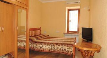 Фото номера Апартаменты с балконом Апартаменты Apartment in Matrosskiy г. Ялта 9