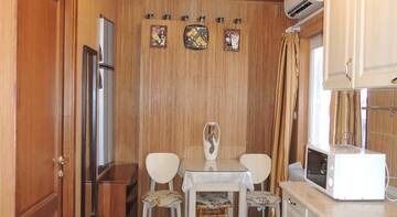 Фото номера Апартаменты с балконом Апартаменты Apartment in Matrosskiy г. Ялта 20