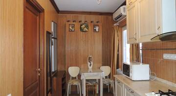 Фото номера Апартаменты с балконом Апартаменты Apartment in Matrosskiy г. Ялта 21