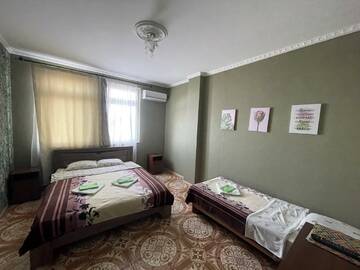 Фото номера 3-местная комната стандарт Гостевой дом Горный Воздух г. Ялта 10