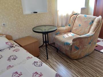 Фото номера Двухместный номер с 2 отдельными кроватями, вид на сад Гостиница Guest House Spendiarova г. Ялта 7