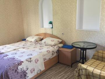 Фото номера Двухместный номер с 2 отдельными кроватями, вид на сад Гостиница Guest House Spendiarova г. Ялта 8