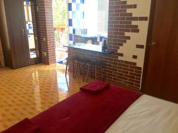 Фото номера Номер-студия с террасой Гостиница Guest House Spendiarova г. Ялта 7