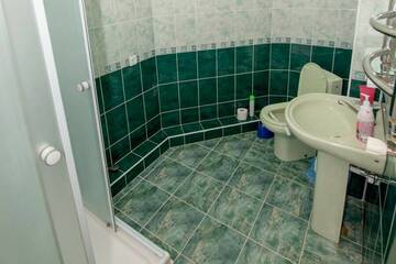 Фото номера 1-к студия с удобствами и кухней  в номере Гостевой дом Над морем г. Ялта 3