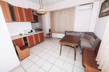 Фото номера Стандарт с общей ванной комнатой и общей кухней. Гостевой дом Над морем г. Ялта 4